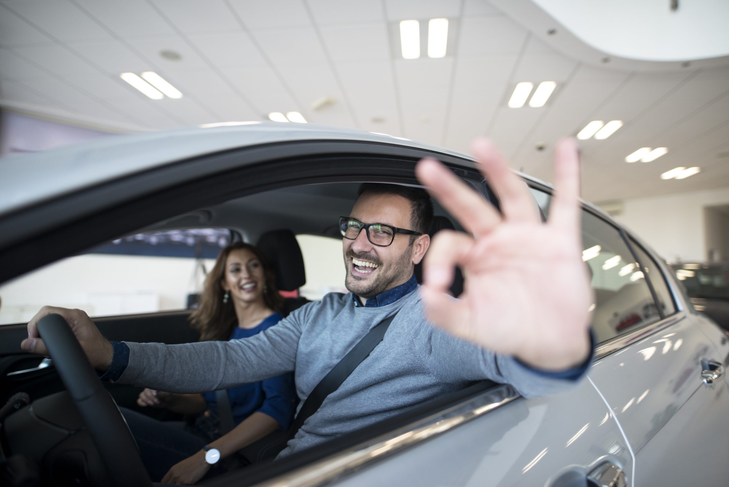 happy couple after tax deduction with mileage rate of 2024