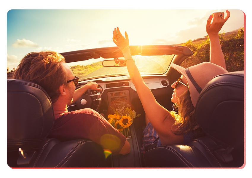 couple in car happy for irs mileage rates