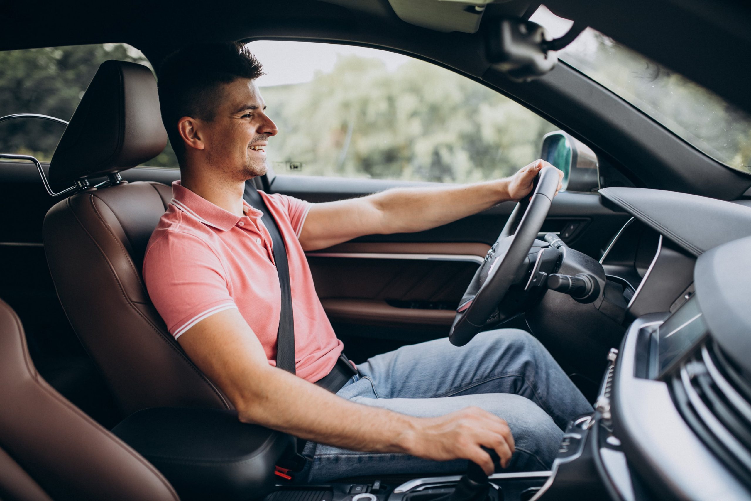 happy man driving his car