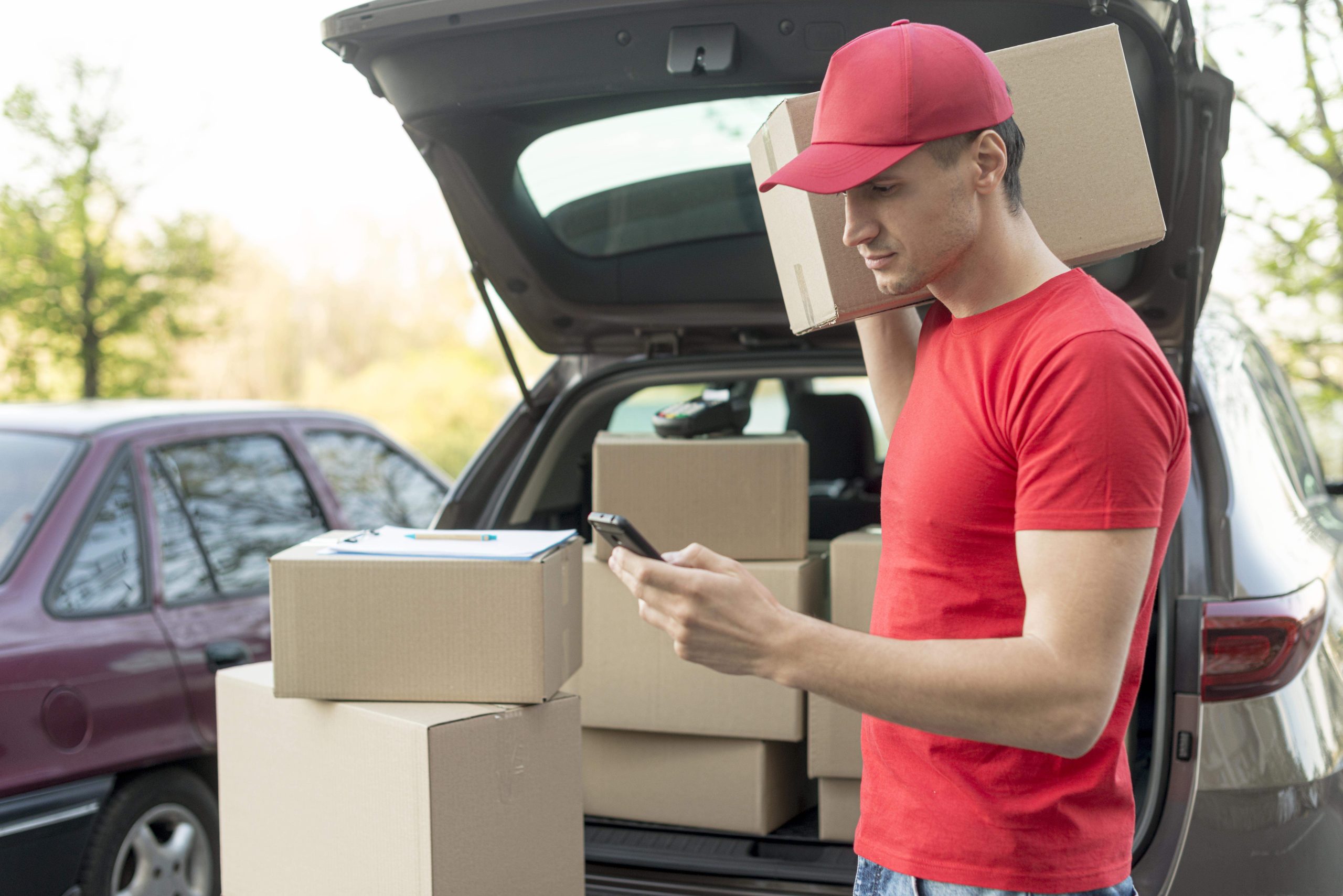 1099 worker diligently tracking their mileage deductions using the user-friendly MileageWise platform on their laptop, ensuring every mile counts for their tax savings.