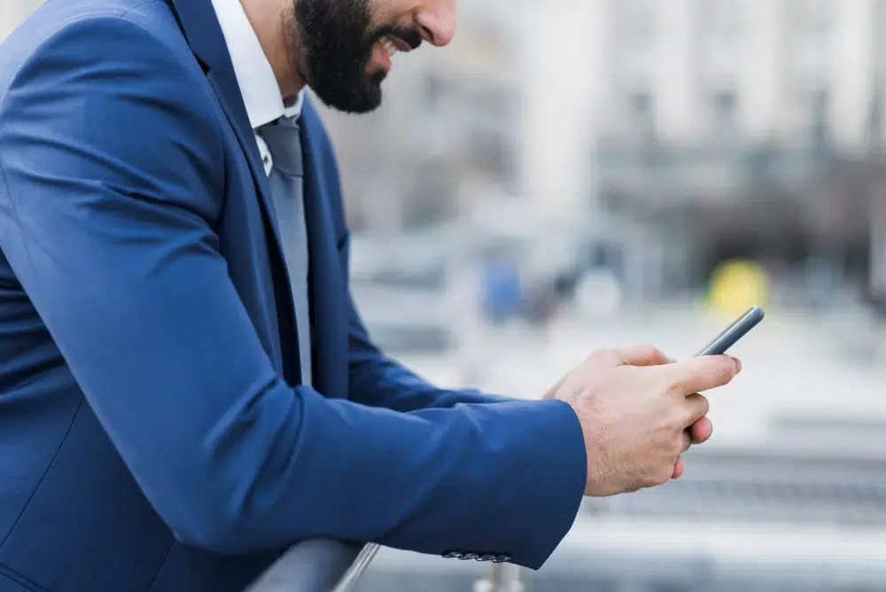 Image by freepik man browsing business mileage trackers