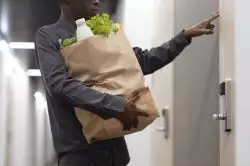 Scipcart driver has arrived and rings the doorbell